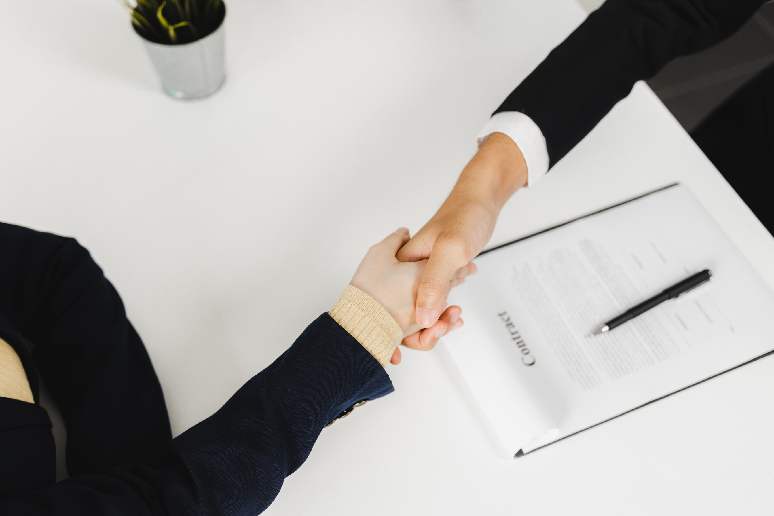 Successful negotiating and business deal, close up  top view